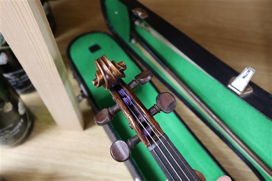 A 19th century (1822) single back violin by John Gough, who worked for Dearloves in Leeds, cased with two bows.